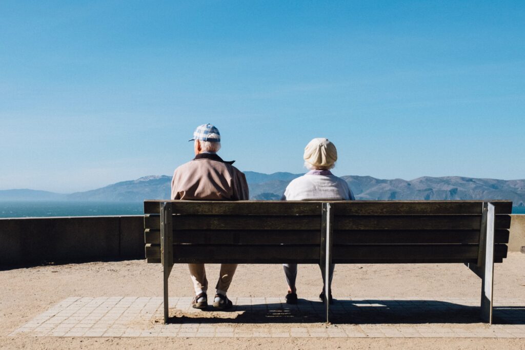 Senior couple relaxing at ocean