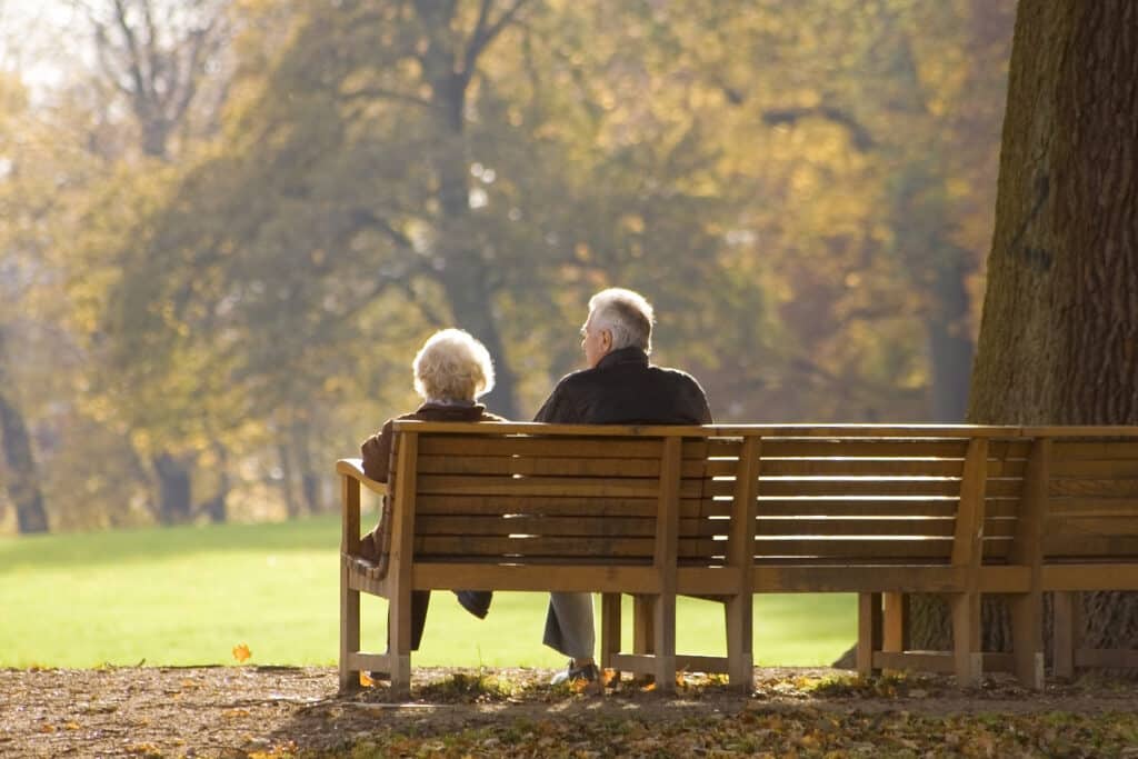 Couple sitting outside enjoying the sun