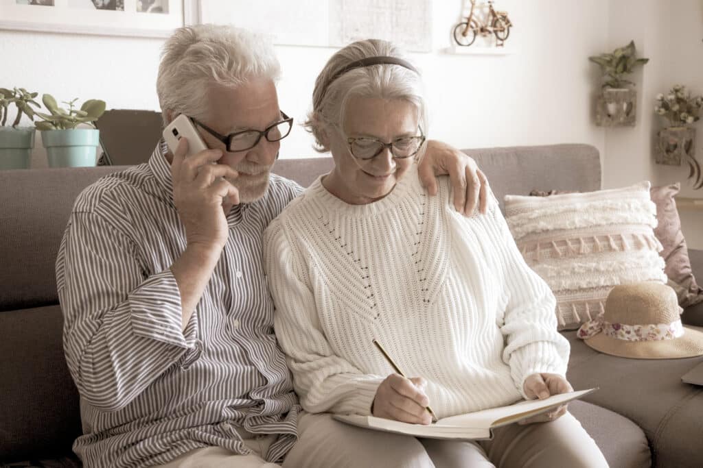 Photo of couple weighing their senior care living options