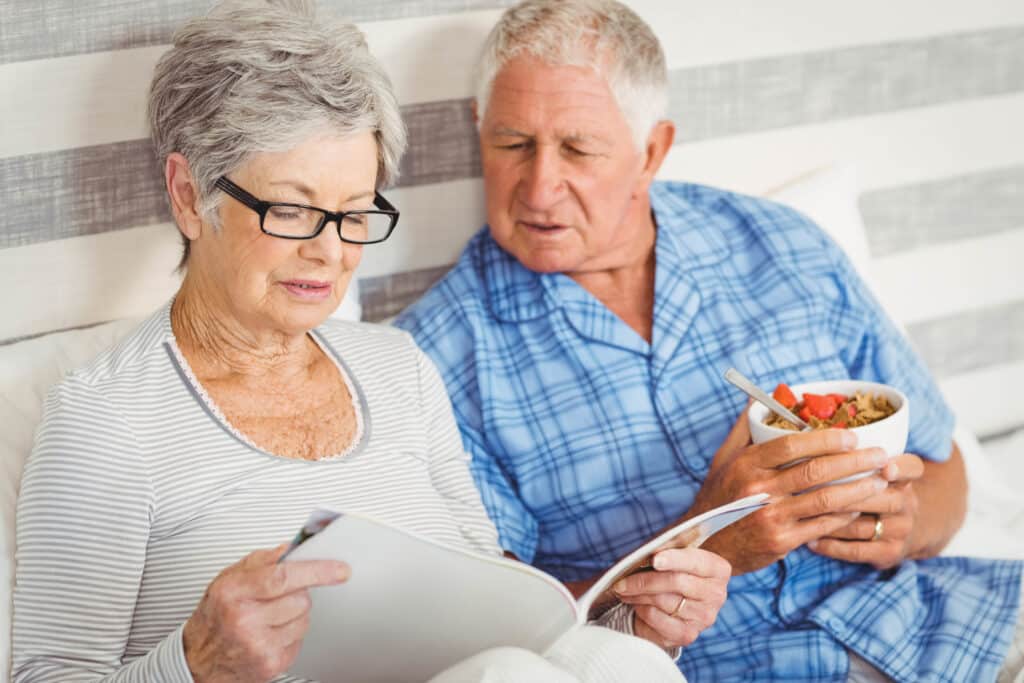 A couple reading a magazine