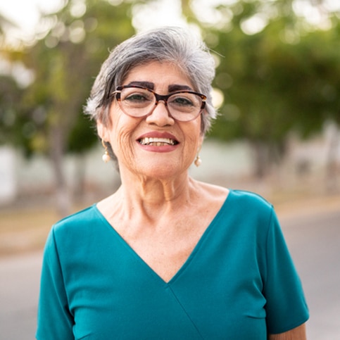 Photo of woman with glasses smiling
