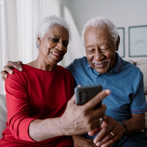 Couple using their cellphone