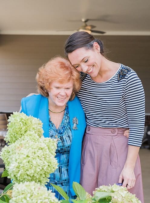 Two People Hugging happily