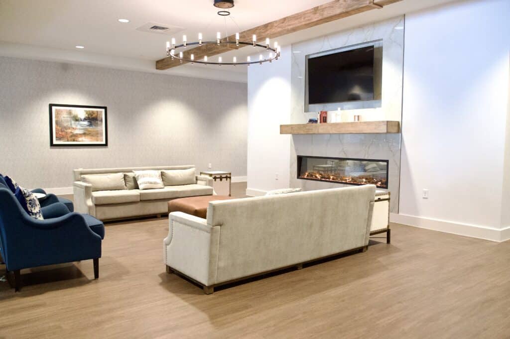 Landmark Lifestyles at Bryant couch common area