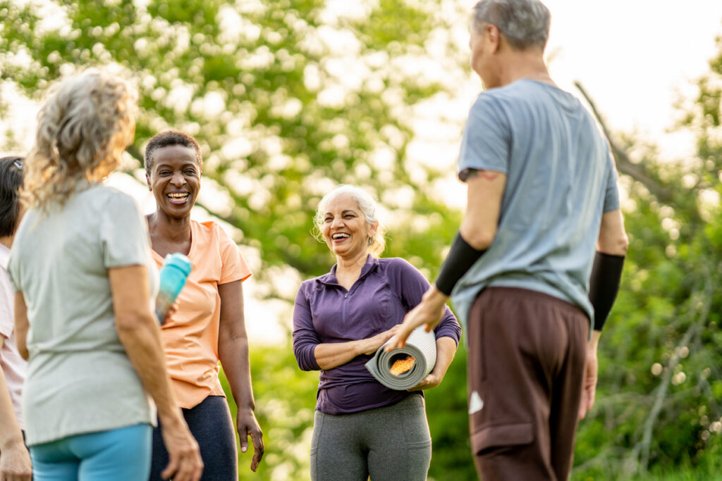Group of seniors socializing after a yoga class