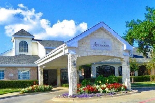 Appletree Court entrance with flowers