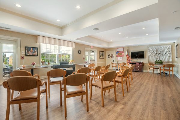 TV room with lots of chairs