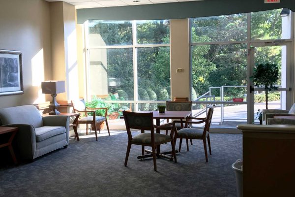 Common area with view of outside trees
