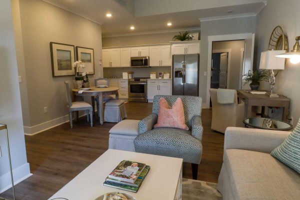 Kitchen and living room in apartment at Vitality Living Madison