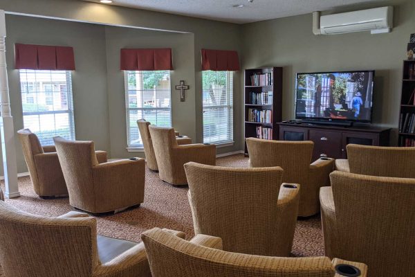 Media room with TV and chairs