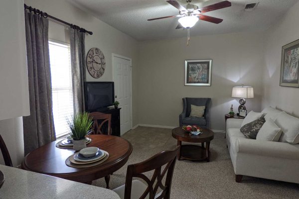 Model living room with TV and couch