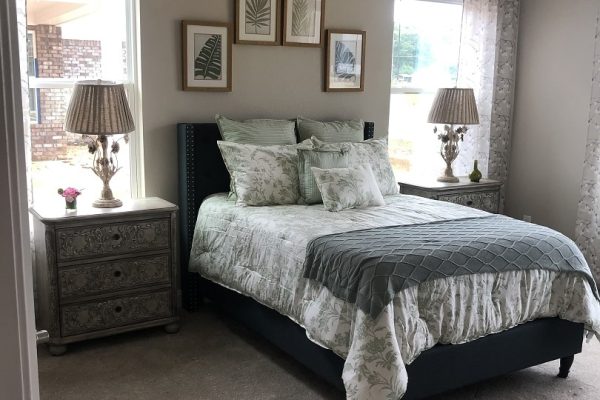 Model bedroom with bed and two nightstands