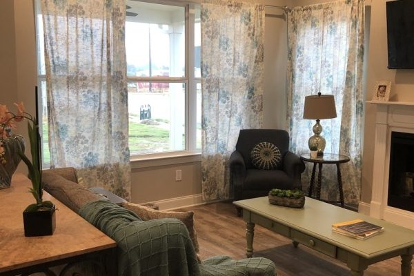 Model living room with lots of seats
