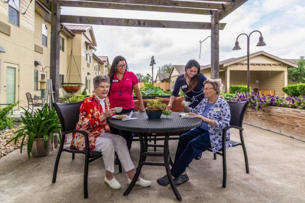Residents enjoying coffee outside