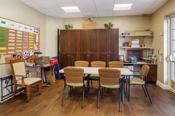 Activities room with board games and seating