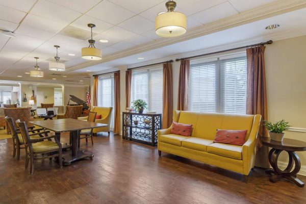 Common area with seats and piano