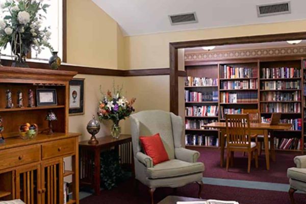 Library with lots of books and seats