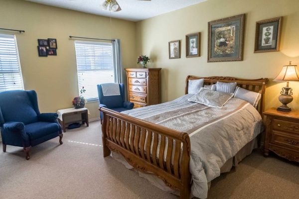 Model Bedroom with bed and chairs